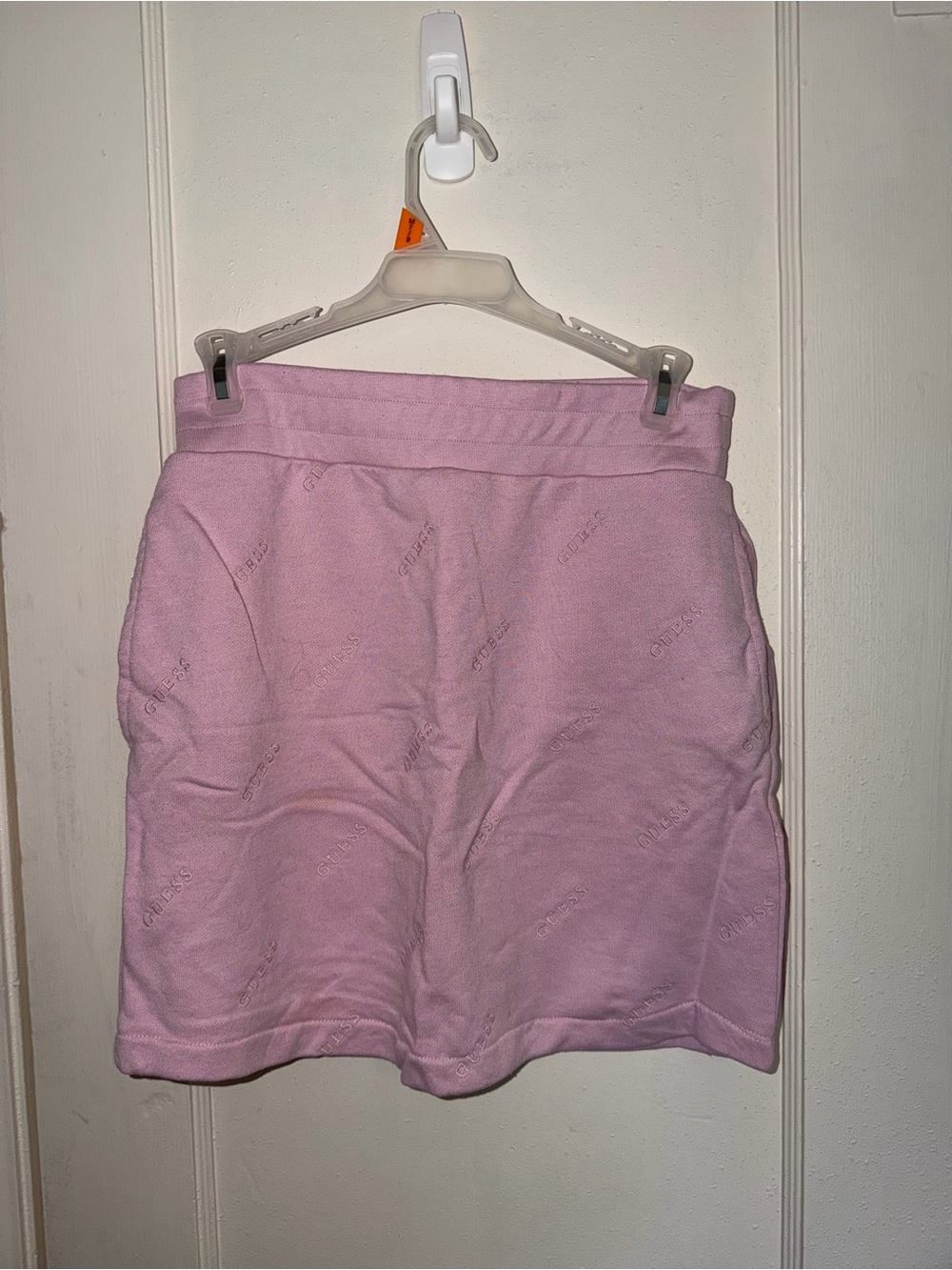 Guess Soft Light Pink Mini Skirt with Logo Detail and pockets. Good condition. M